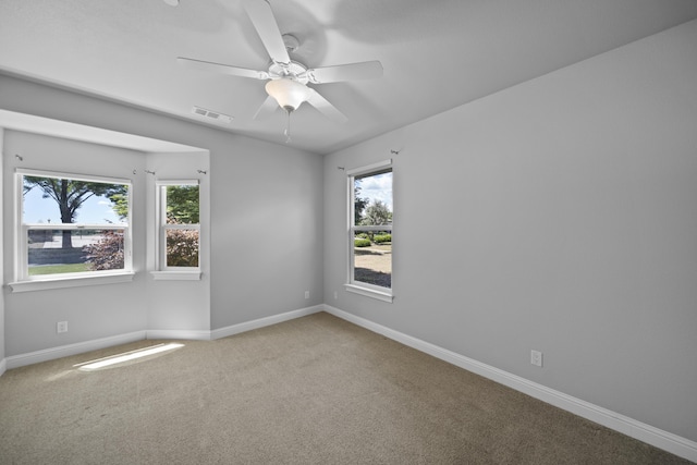 831 Santa Cruz Dr, Redding, CA 96003 - carpeted empty room with baseboards and a ceiling fan