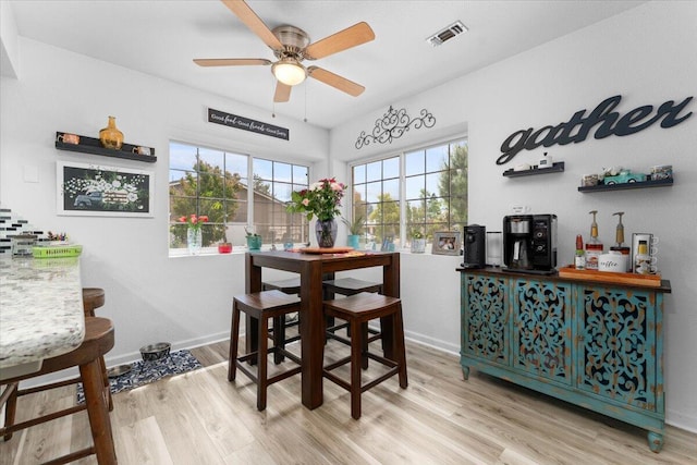 7597 Terra Linda Way, Redding, CA 96003 - dining room with ceiling fan, wood finished floors, and healthy amount of natural light