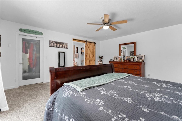 7597 Terra Linda Way, Redding, CA 96003 - carpeted bedroom with a barn door, ceiling fan, and baseboards