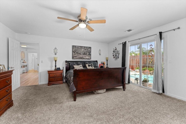 7597 Terra Linda Way, Redding, CA 96003 - carpeted bedroom with access to outside, ceiling fan, and baseboards
