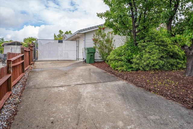 7597 Terra Linda Way, Redding, CA 96003 - exterior space with fence, a gate, and concrete driveway