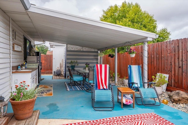 7597 Terra Linda Way, Redding, CA 96003 - view of patio with fence and a sink