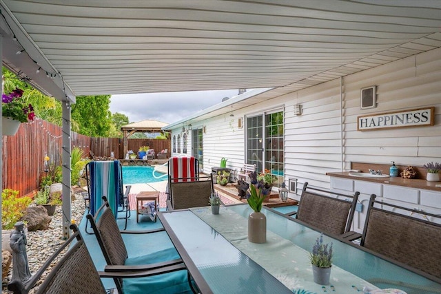 7597 Terra Linda Way, Redding, CA 96003 - view of patio featuring outdoor dining area and a fenced backyard