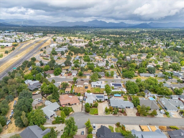 7597 Terra Linda Way, Redding, CA 96003 - aerial view of property's location with nearby suburban area and a mountain backdrop