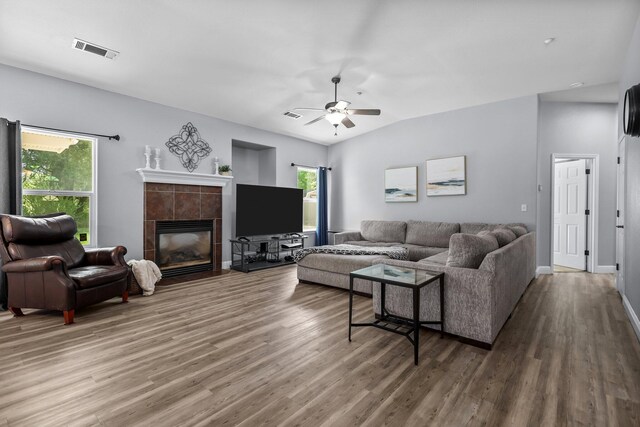 406 Spire Point Dr, Redding, CA 96003 - living room with wood finished floors, plenty of natural light, and a ceiling fan