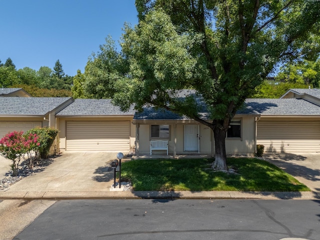 1836 Del Mar Ave, Redding, CA 96003 - ranch-style home featuring an attached garage, driveway, and a front lawn