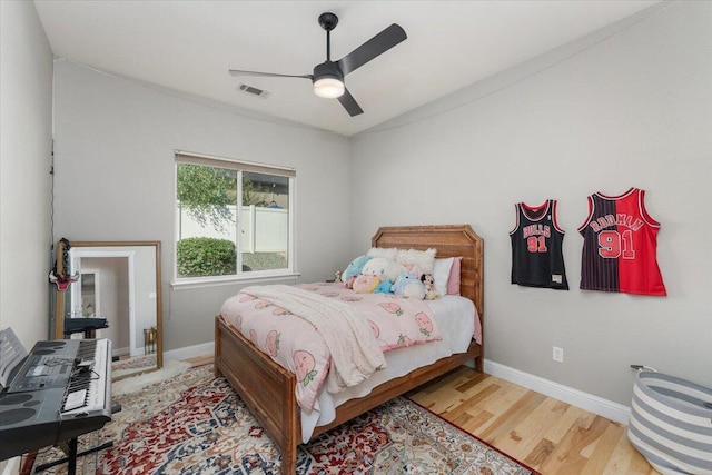 1235 Chandon Ct, Redding, CA 96003 - bedroom featuring lofted ceiling, wood finished floors, baseboards, and a ceiling fan