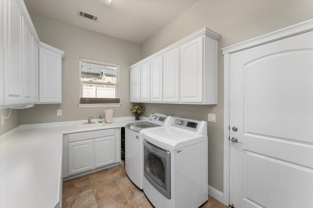 1235 Chandon Ct, Redding, CA 96003 - laundry room with washing machine and clothes dryer and cabinet space