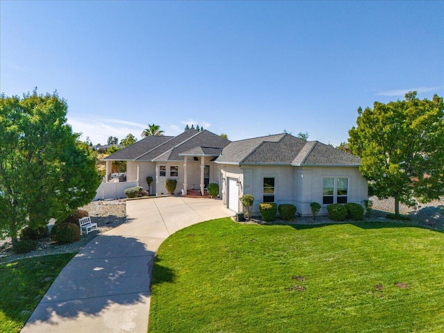 1235 Chandon Ct, Redding, CA 96003 - view of front of property with driveway, a front yard, an attached garage, stucco siding, and a shingled roof