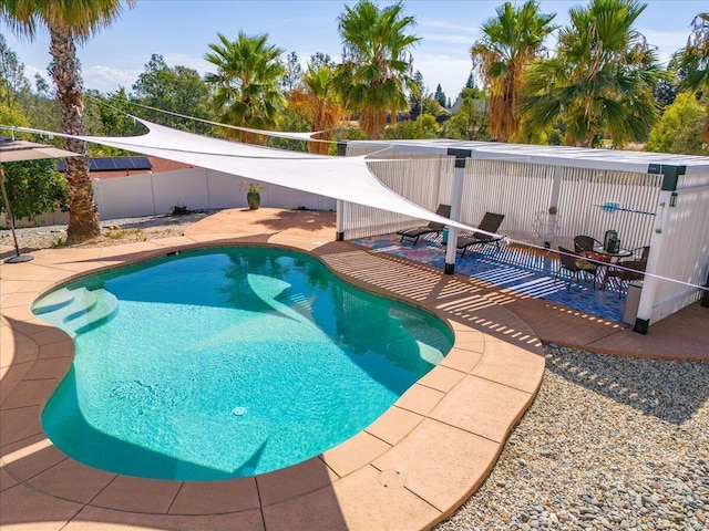 1235 Chandon Ct, Redding, CA 96003 - view of pool with a fenced backyard and a patio area
