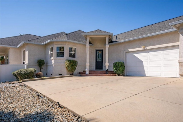 1235 Chandon Ct, Redding, CA 96003 - ranch-style house with concrete driveway, stucco siding, an attached garage, and a shingled roof