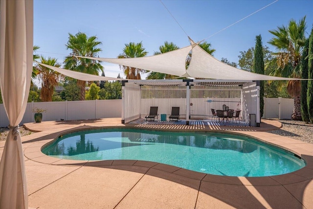 1235 Chandon Ct, Redding, CA 96003 - view of swimming pool with a patio area and a fenced backyard