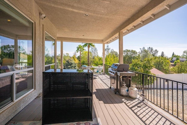 1235 Chandon Ct, Redding, CA 96003 - wooden terrace featuring a grill and outdoor lounge area