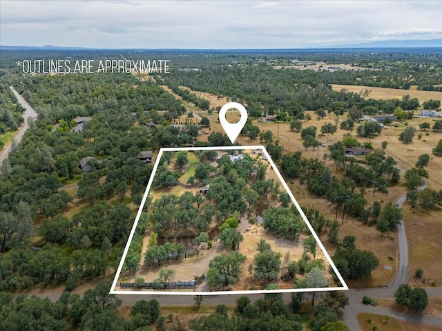 19697 Old Indian Trl, Redding, CA 96003 - aerial view of property's location with property boundaries highlighted and a heavily wooded area