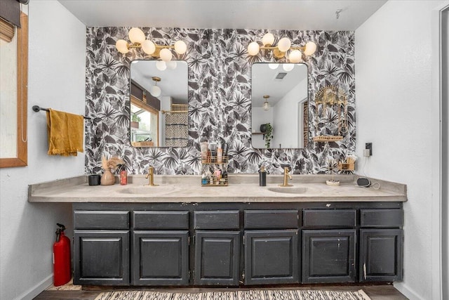 19697 Old Indian Trl, Redding, CA 96003 - bathroom featuring baseboards, double vanity, and wood finished floors