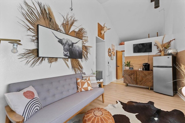 19697 Old Indian Trl, Redding, CA 96003 - living room featuring wood finished floors and high vaulted ceiling