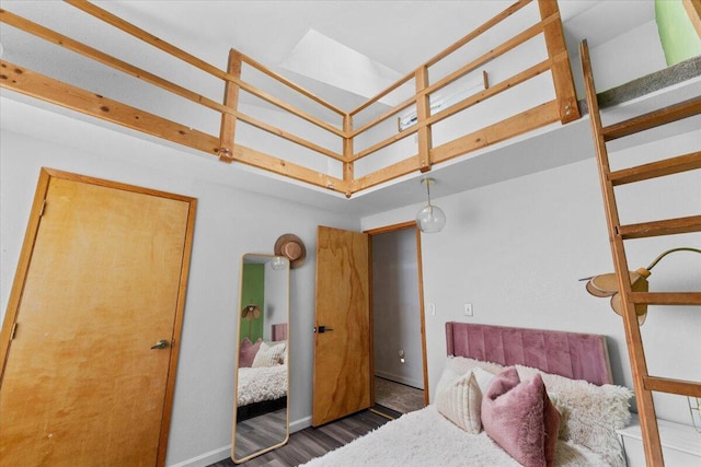 19697 Old Indian Trl, Redding, CA 96003 - bedroom featuring a high ceiling, wood finished floors, and baseboards