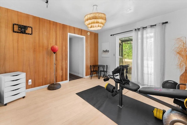 19697 Old Indian Trl, Redding, CA 96003 - workout area featuring wood finished floors, baseboards, and wooden walls