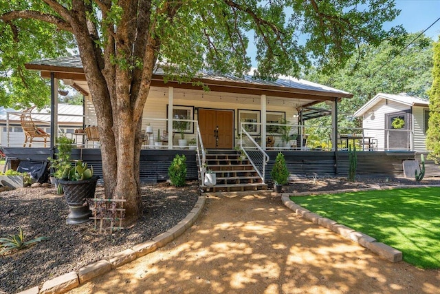 19697 Old Indian Trl, Redding, CA 96003 - view of front of house featuring covered porch and stairway