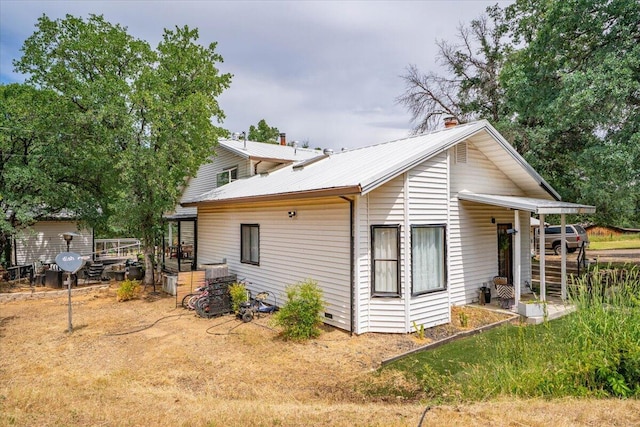 19697 Old Indian Trl, Redding, CA 96003 - rear view of house with metal roof and a chimney