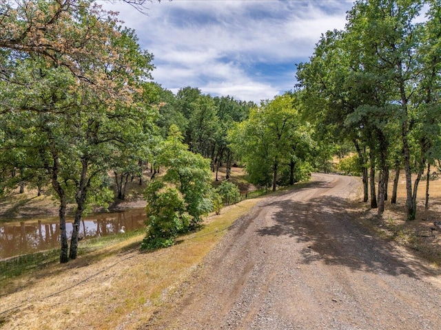 19697 Old Indian Trl, Redding, CA 96003 - view of dirt / gravel road with a water view