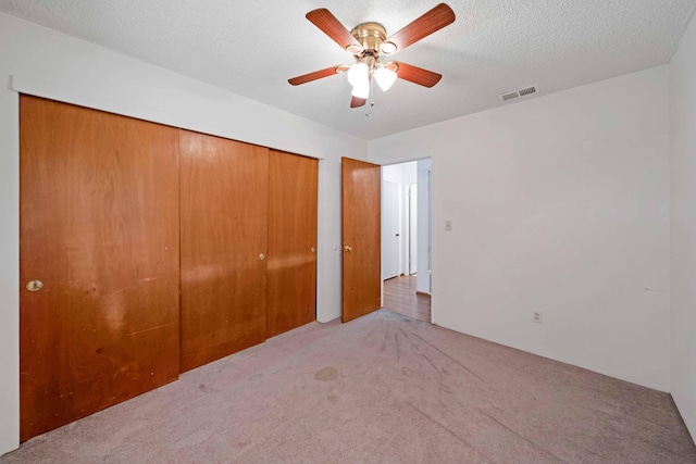 1945 Luning St, Red Bluff, CA 96080 - unfurnished bedroom featuring carpet floors, a closet, and ceiling fan