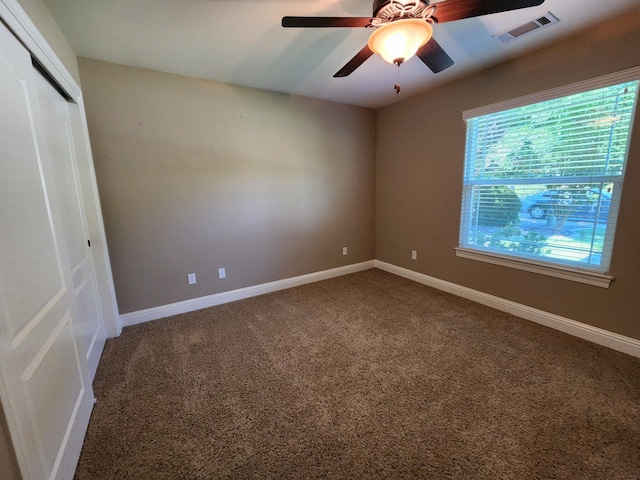 3621 Sacramento Dr, Redding, CA 96001 - unfurnished bedroom featuring carpet floors, a closet, and a ceiling fan
