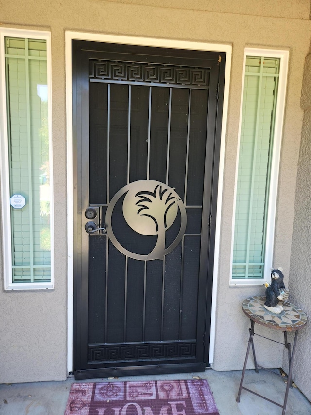 3621 Sacramento Dr, Redding, CA 96001 - view of exterior entry featuring stucco siding