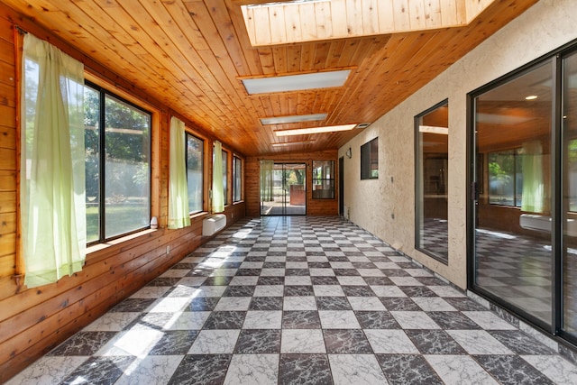 5165 Rancho Vista Way, Redding, CA 96002 - unfurnished sunroom featuring wooden ceiling and a skylight