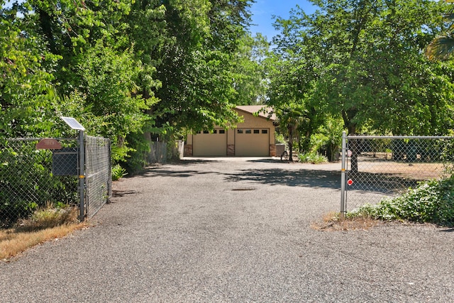 5165 Rancho Vista Way, Redding, CA 96002 - view of front of property featuring fence and a garage