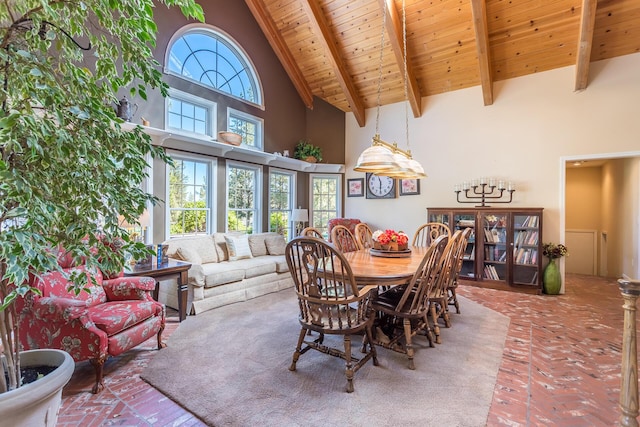 17917 Lakeshore Dr, Weed, CA 96094 - dining room featuring high vaulted ceiling, wood ceiling, brick floors, and beam ceiling
