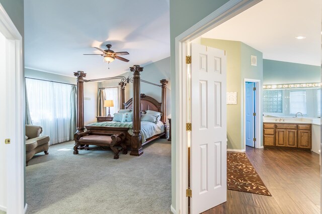 17917 Lakeshore Dr, Weed, CA 96094 - bedroom featuring dark wood-style floors, baseboards, connected bathroom, and a ceiling fan