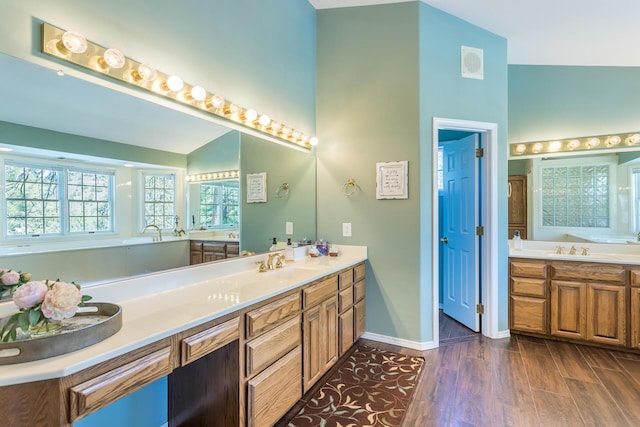 17917 Lakeshore Dr, Weed, CA 96094 - full bath with wood finished floors, a garden tub, vanity, baseboards, and a high ceiling