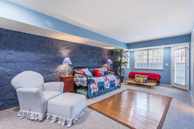 17917 Lakeshore Dr, Weed, CA 96094 - carpeted bedroom featuring an accent wall and access to outside