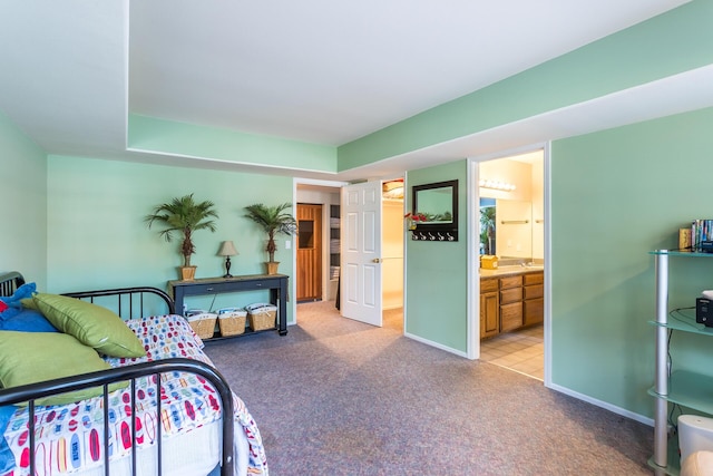 17917 Lakeshore Dr, Weed, CA 96094 - bedroom with light carpet, ensuite bathroom, a spacious closet, and baseboards