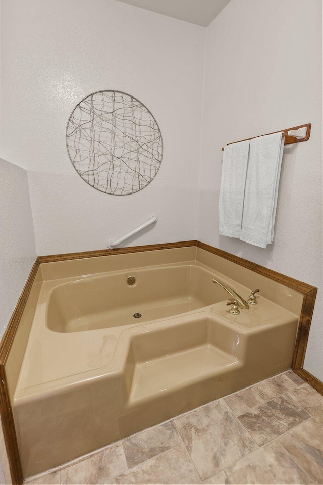 full bathroom with a garden tub