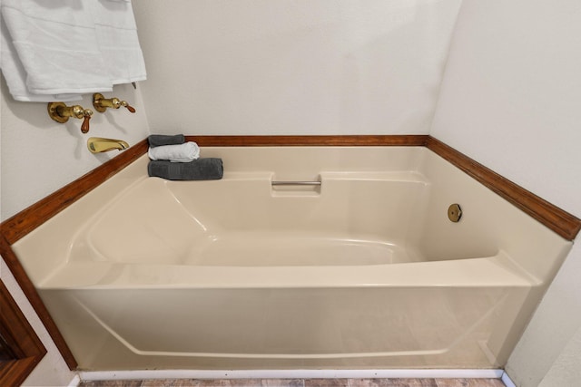 full bathroom with a bathtub