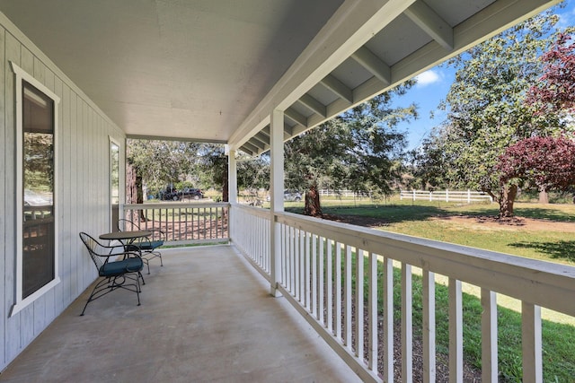 balcony featuring a porch