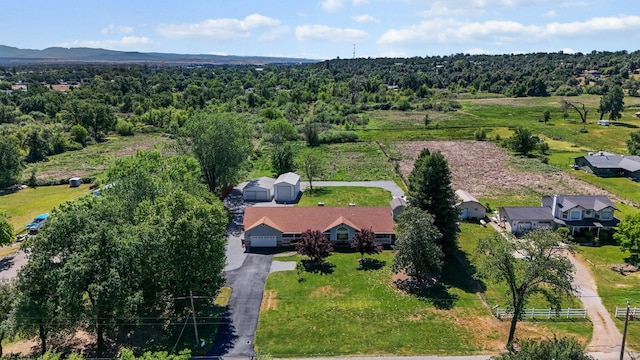 drone / aerial view of a heavily wooded area