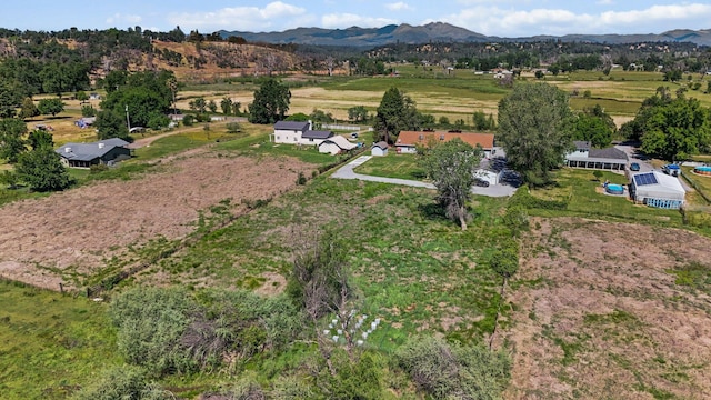 overview of rural landscape featuring a mountain backdrop