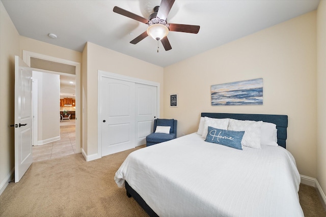 792 Bellagio, Redding, CA 96003 - bedroom with light colored carpet, baseboards, a closet, and ceiling fan