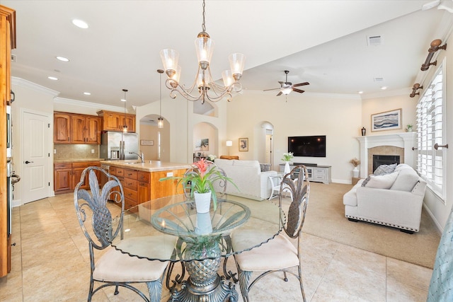 792 Bellagio, Redding, CA 96003 - dining room featuring recessed lighting, arched walkways, a ceiling fan, ornamental molding, and a chandelier