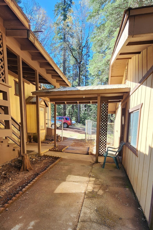 7670 Cedar Crest Rd, Shingletown, CA 96088 - view of patio / terrace featuring a carport