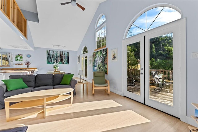 12876 E Fork Rd, French Gulch, CA 96033 - interior space featuring high vaulted ceiling, light wood-style floors, a ceiling fan, and french doors