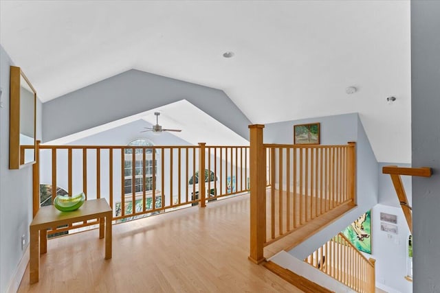 12876 E Fork Rd, French Gulch, CA 96033 - hallway with vaulted ceiling, wood finished floors, and baseboards