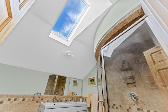 12876 E Fork Rd, French Gulch, CA 96033 - bathroom view of a shower stall, a skylight, and vanity