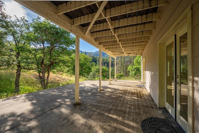 12876 E Fork Rd, French Gulch, CA 96033 - view of patio with french doors and a mountain view