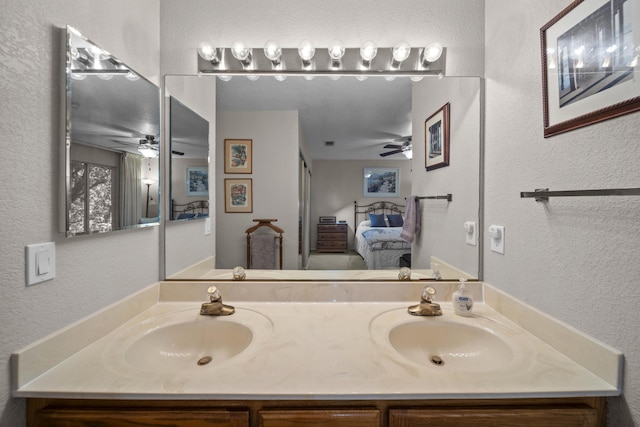 200 Ridgetop Dr # 26, Redding, CA 96003 - ensuite bathroom with ceiling fan, a textured wall, and double vanity