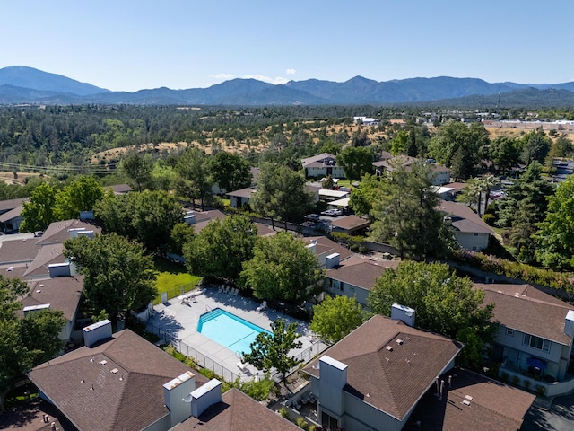 200 Ridgetop Dr # 26, Redding, CA 96003 - aerial perspective of suburban area featuring a mountain backdrop and a pool