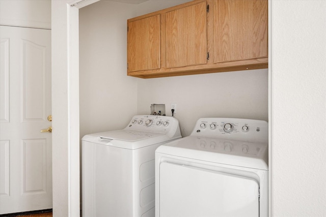 117 Yolla Bolly Trl, Redding, CA 96003 - clothes washing area with cabinet space and washing machine and clothes dryer
